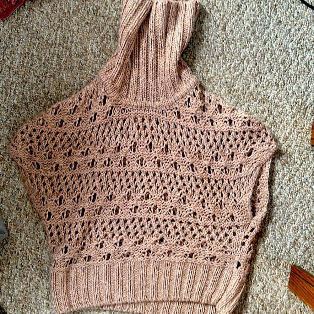 Jennifer Lopez Sleeveless turtle neck sweater top